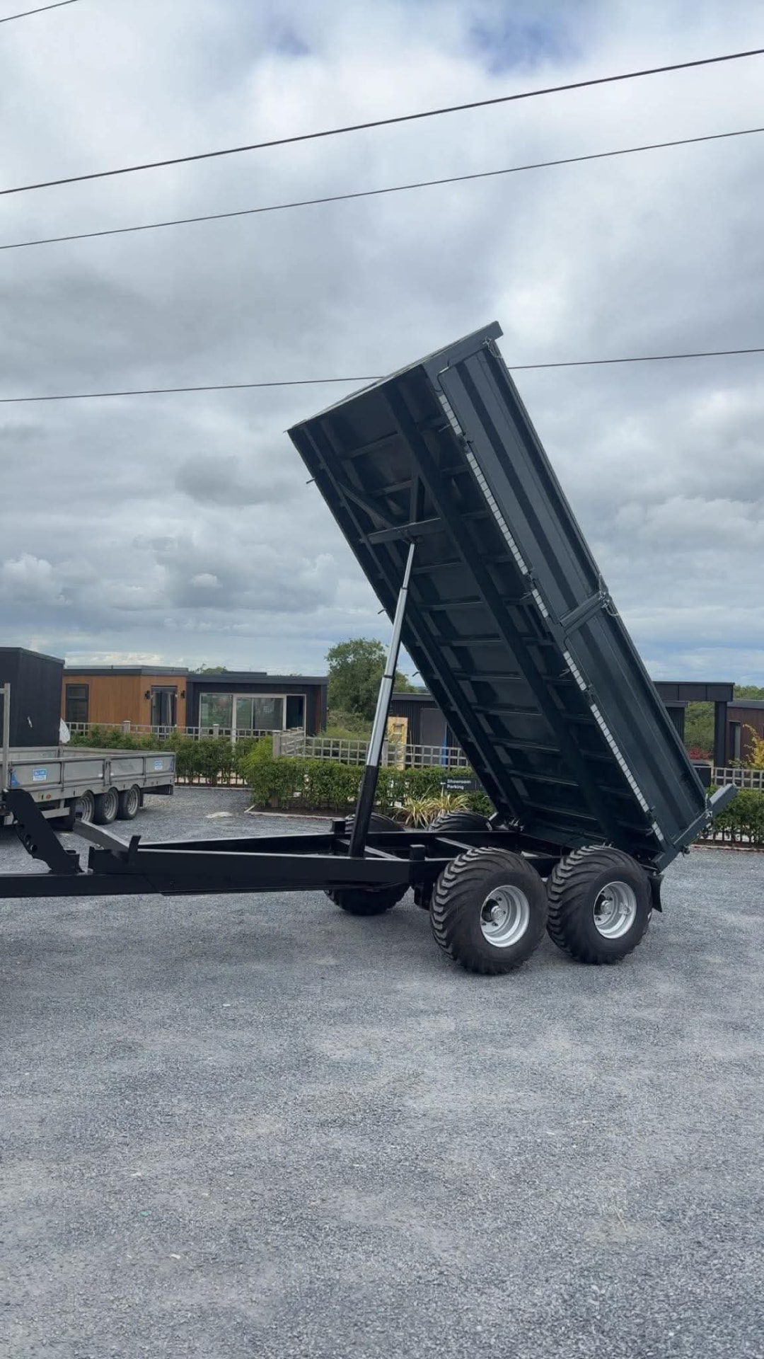 MT Plant tipping trailer with the body fully raised